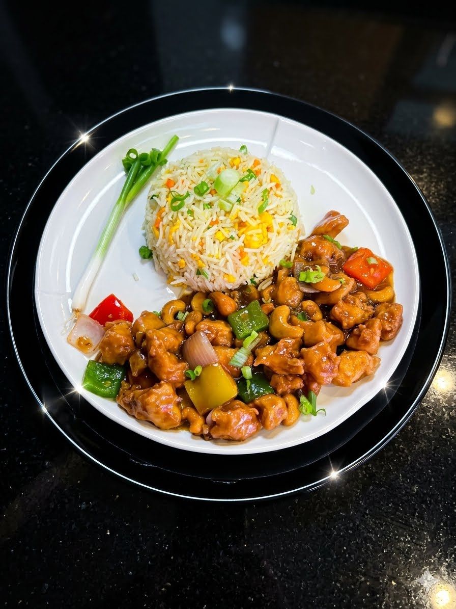 دجاج بالكاجو at Cock "N" Bull. دجاج سوتيه مع الكاجو والبصل والجزر والفلفل في صلصة المحار Pakistani restaurant in Al Majarra, Sharjah, UAE