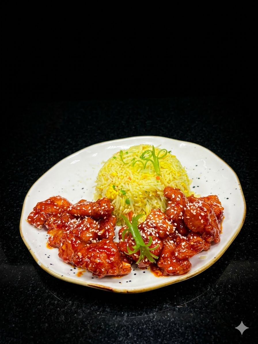 دجاج مقرمش بالعسل at Cock "N" Bull. دجاج مقلي مغطى بصلصة حلوة ومالحة، يقدم مع الأرز المقلي بالبيض Pakistani restaurant in Al Majarra, Sharjah, UAE